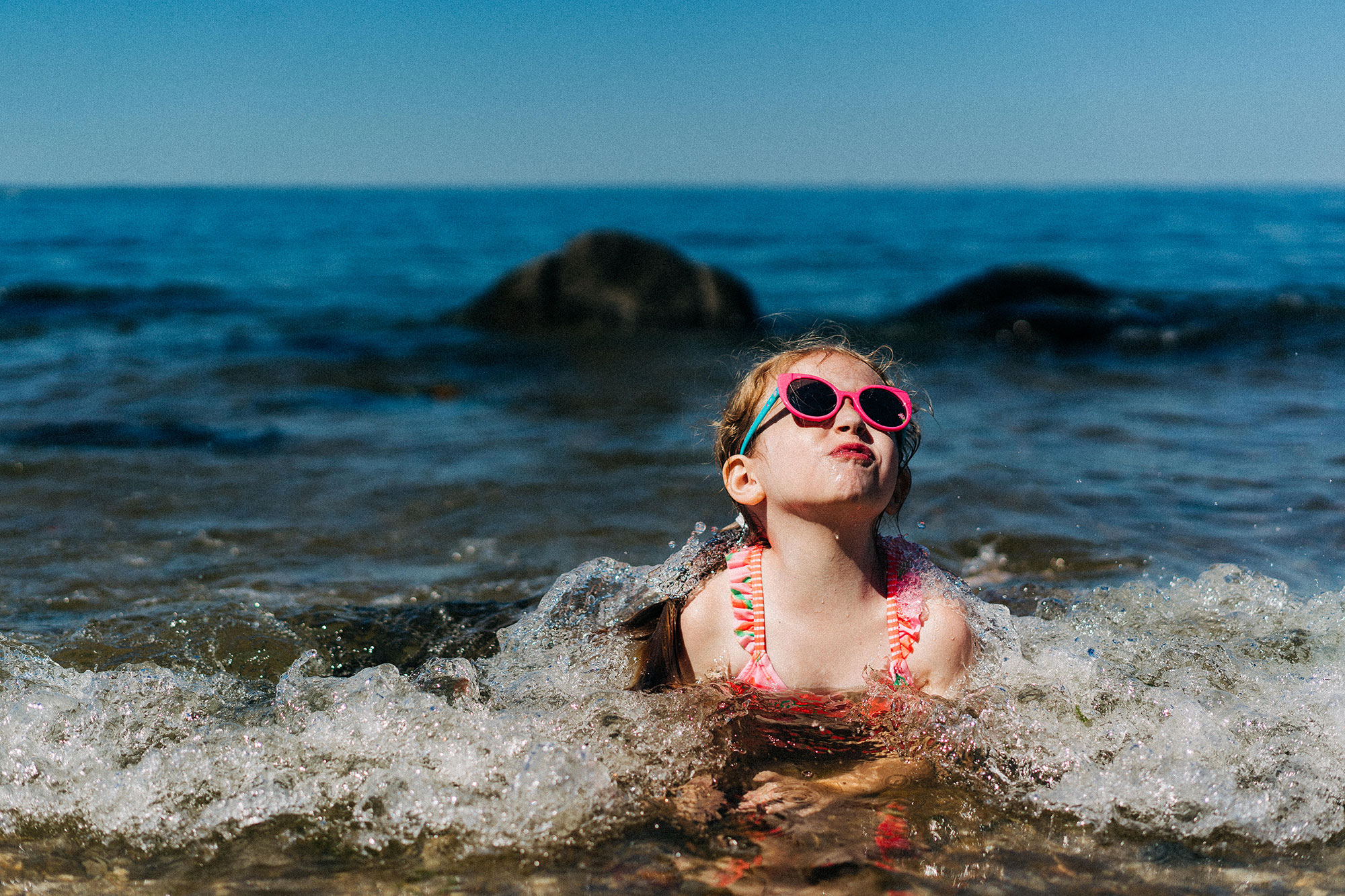 Girl swimming in Long Island Sound