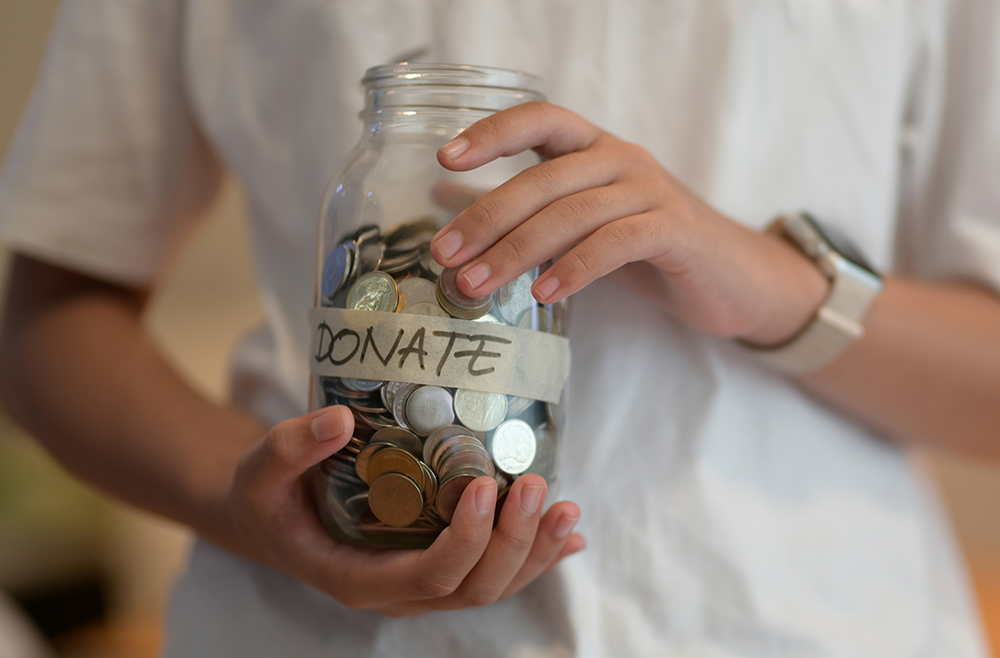 Donation jar full of money